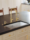 Perrin & Rowe Southbank kitchen faucet and filtered water faucet in an Unlacquered Brass kitchen setting