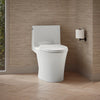 Veil® One-piece elongated toilet with skirted trapway, dual-flush