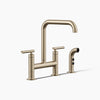 Kohler Two-hole bridge kitchen sink faucet with side sprayer