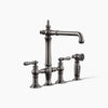 Kohler Three-hole bridge kitchen sink faucet with side sprayer