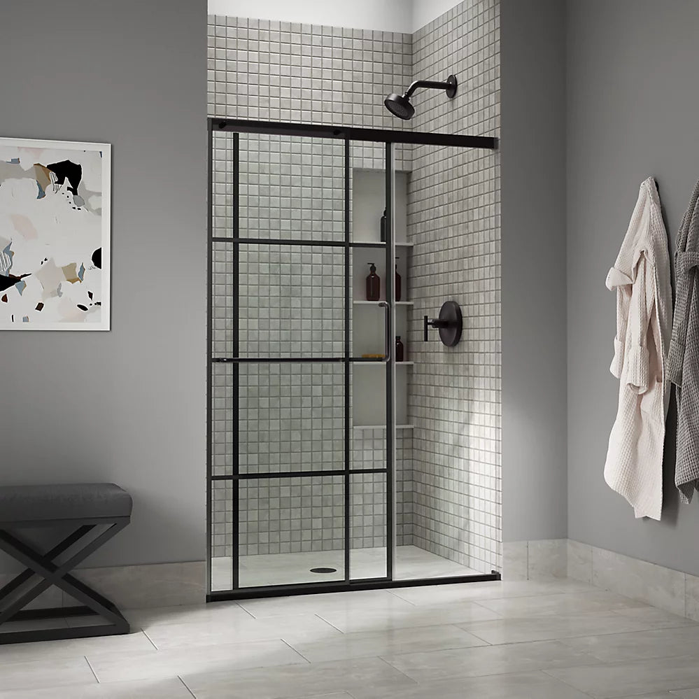 Kohler Sliding shower door, 70-1/2" H x 44-1/4 - 47-5/8" W, with 1/4" thick Crystal Clear glass with rectangular grille pattern