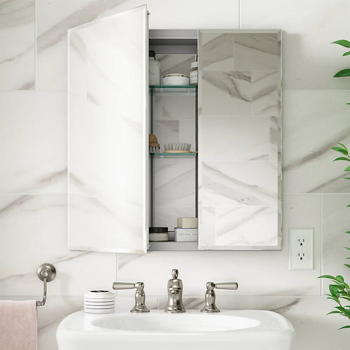 Kohler 25" W x 26" H aluminum two-door medicine cabinet with mirrored doors, beveled edges