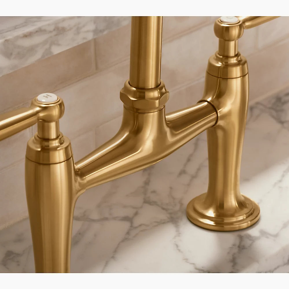 Kohler Two-hole bridge kitchen sink faucet with side sprayer
