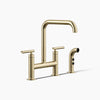 Kohler Two-hole bridge kitchen sink faucet with side sprayer