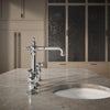 Kohler Two-hole bridge bar sink faucet with side sprayer