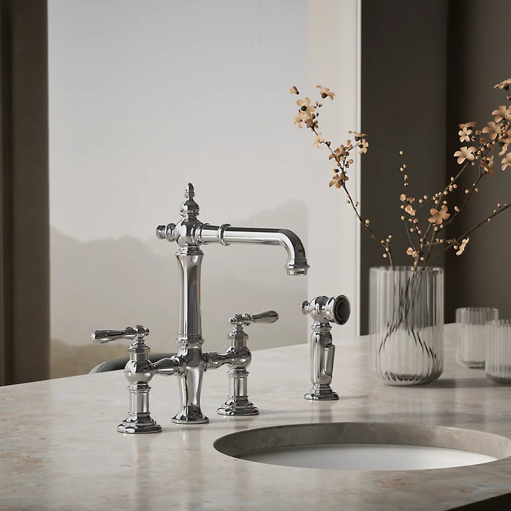 Kohler Two-hole bridge bar sink faucet with side sprayer