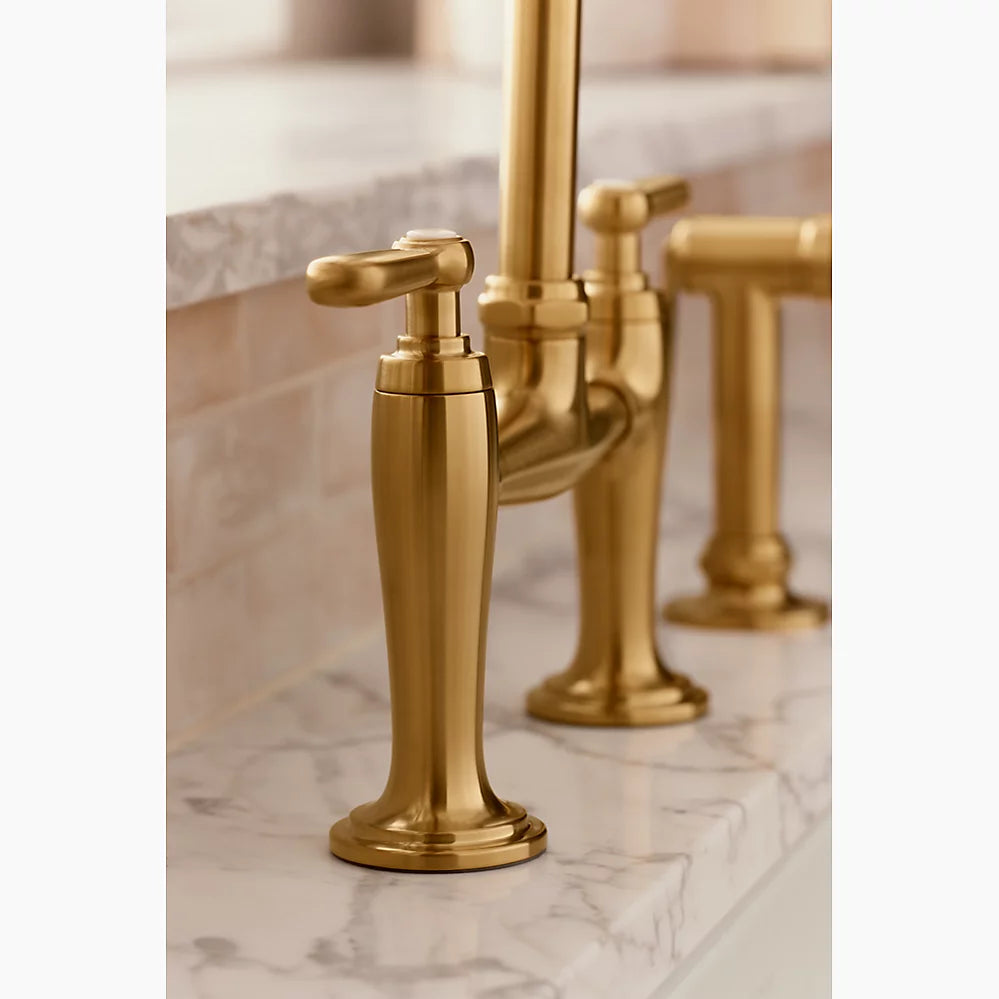 Kohler Two-hole bridge kitchen sink faucet with side sprayer