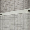 Kohler Sliding shower door, 75-1/2" H x 62-1/4 - 65-5/8" W with heavy 5/16" thick Crystal Clear glass with privacy band