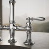 Kohler Two-hole bridge bar sink faucet with side sprayer