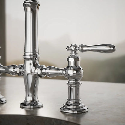 Kohler Two-hole bridge bar sink faucet with side sprayer
