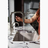 Kohler Touchless pull-down kitchen sink faucet with two-function sprayhead