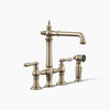 Kohler Three-hole bridge kitchen sink faucet with side sprayer
