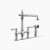 Kohler Three-hole bridge kitchen sink faucet with side sprayer