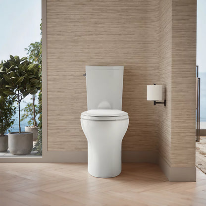 Kohler Two-piece elongated toilet with skirted trapway, dual-flush