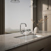 Kohler Single-handle kitchen sink faucet with two-function extended-reach spout and side sprayer
