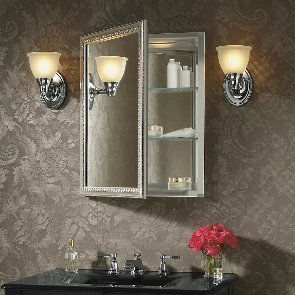Kohler 20" W x 26" H aluminum single-door medicine cabinet with decorative silver framed mirrored door
