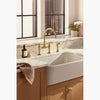 Kohler Two-hole bridge kitchen sink faucet with side sprayer