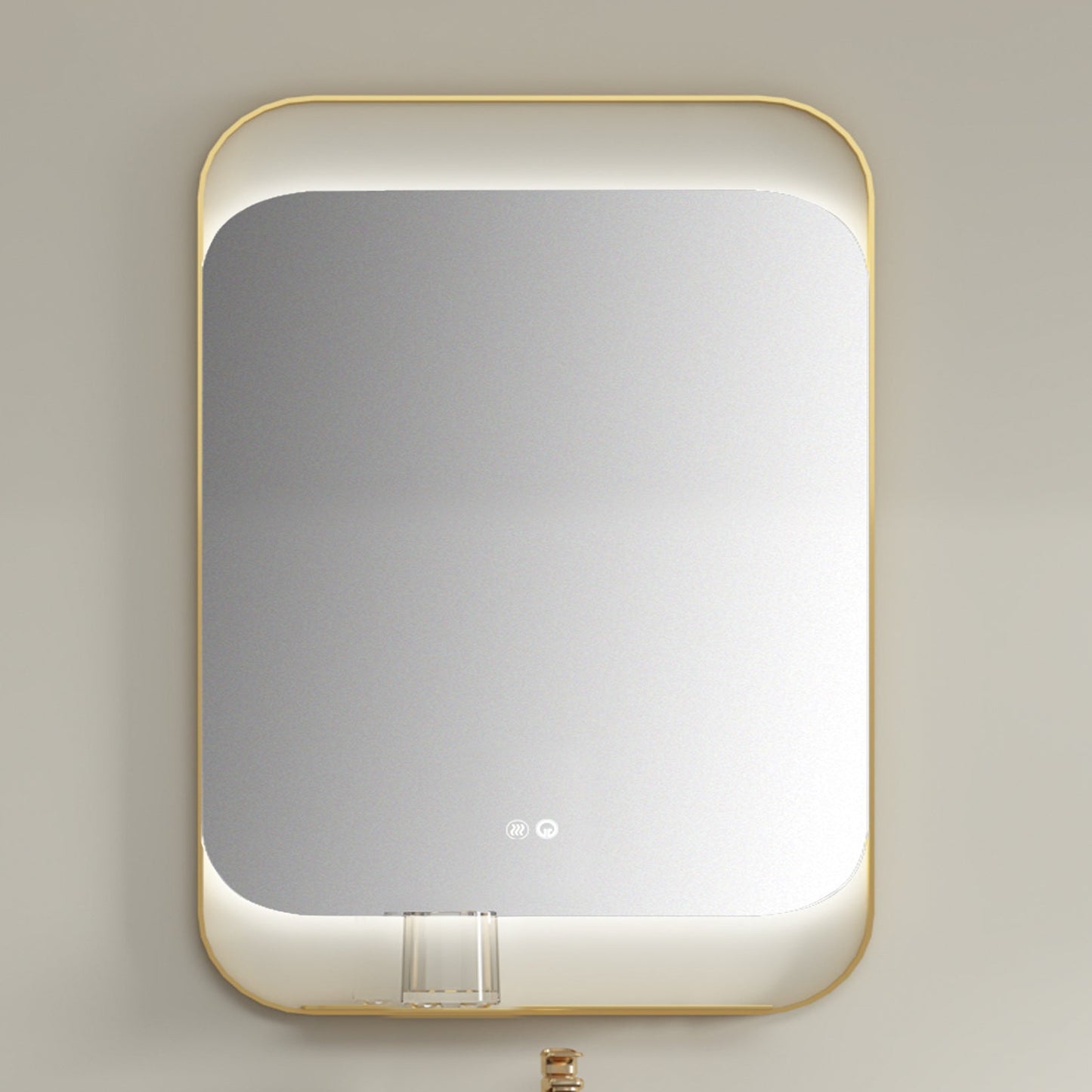 Rectangular mirror with gold frame on a beige wall