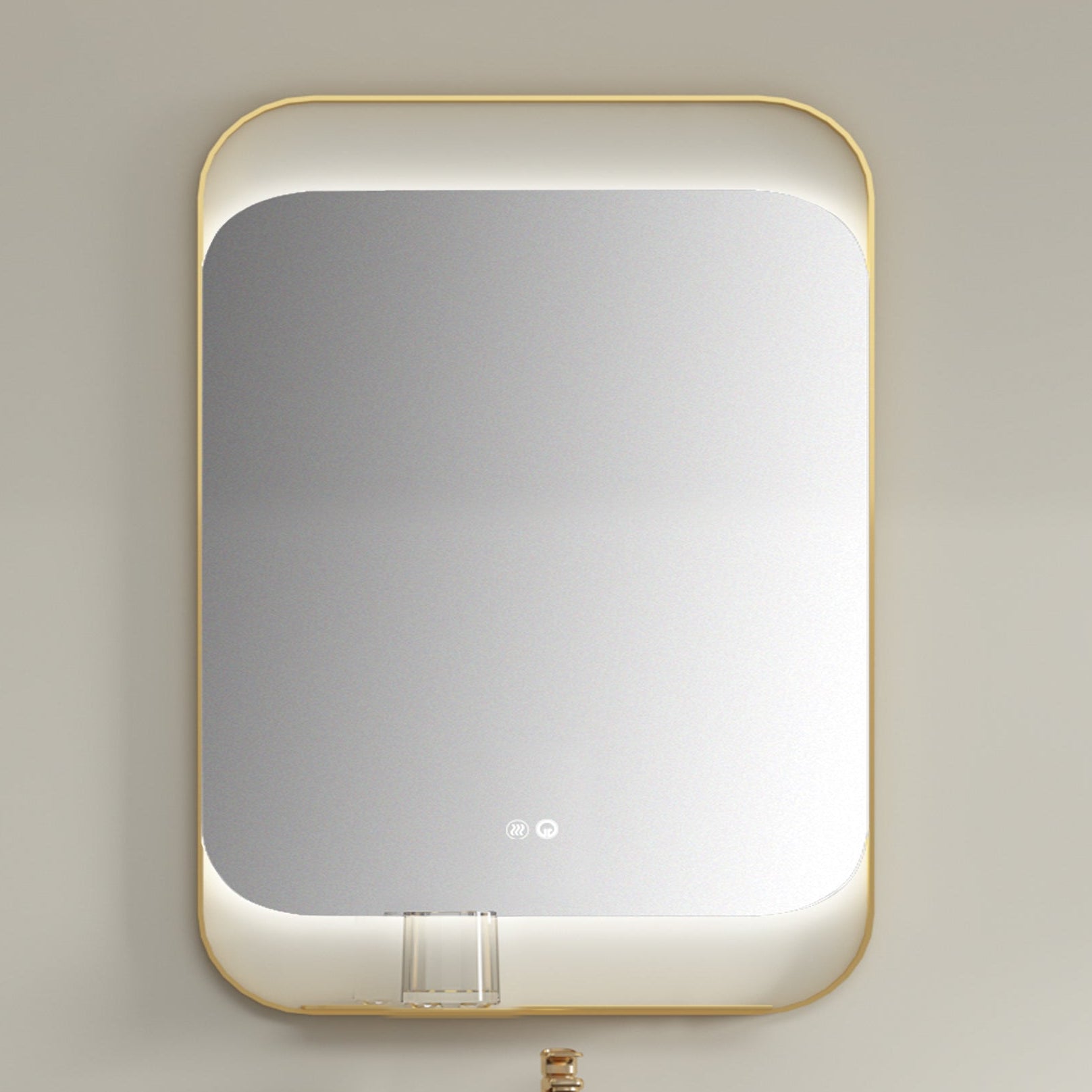 Rectangular mirror with gold frame on a beige wall
