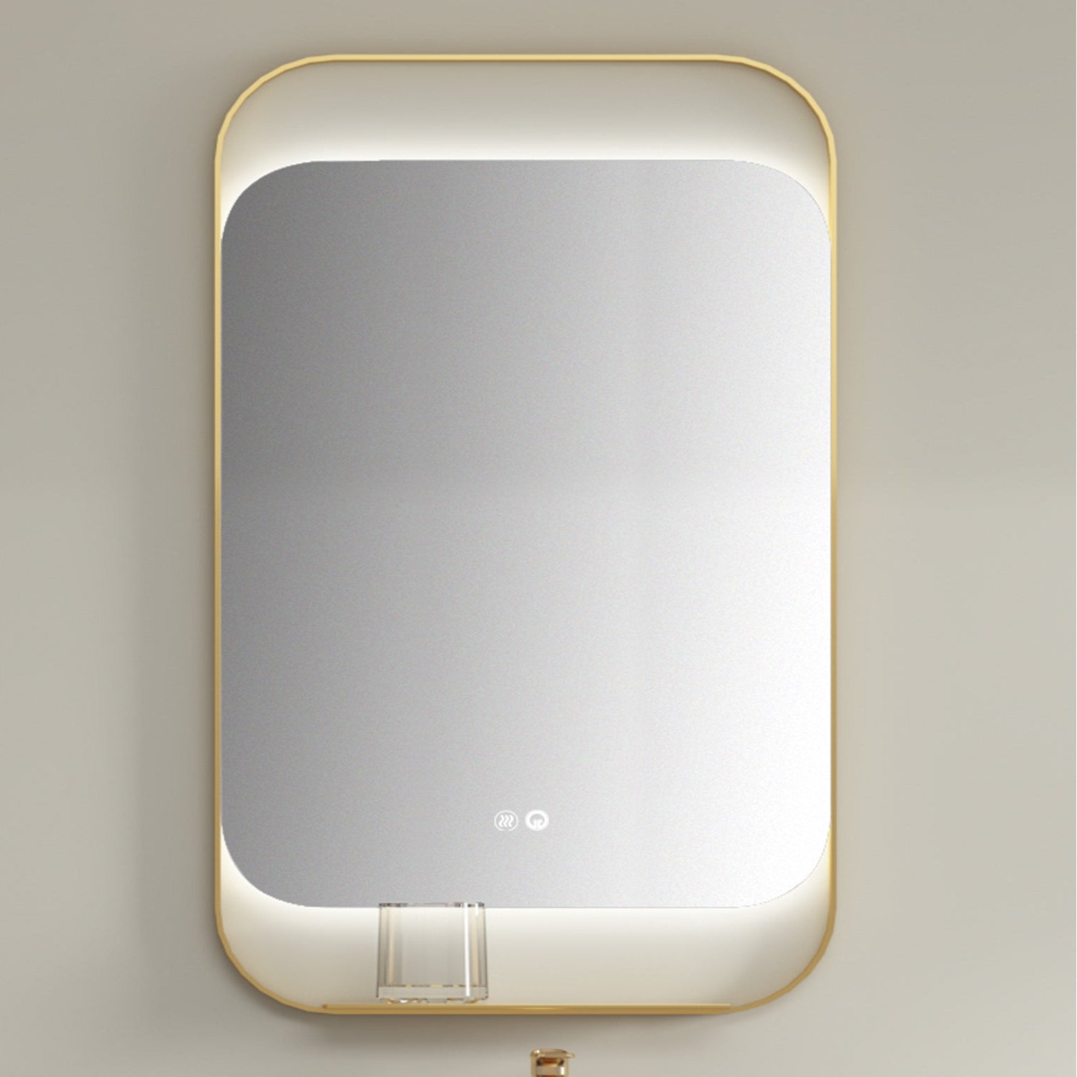 Rectangular mirror with gold frame on a light gray wall