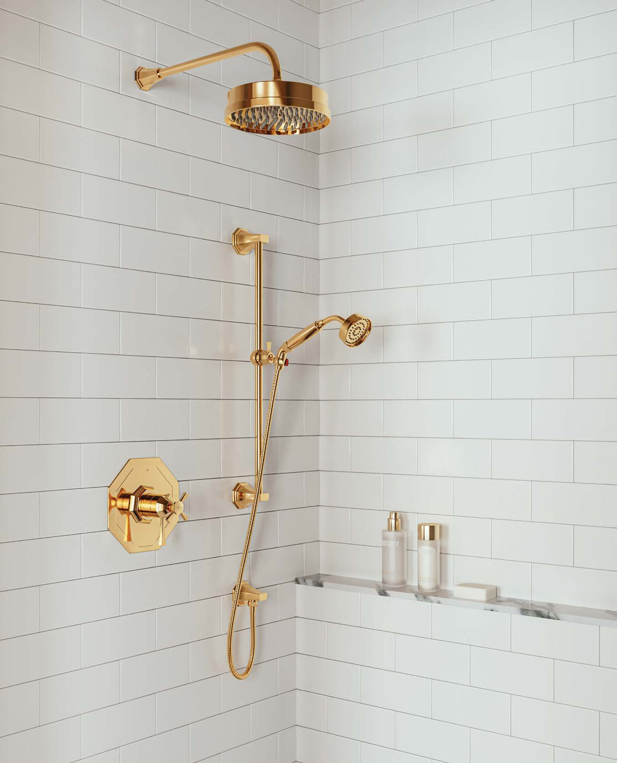 Perrin & Rowe Deco shower components in a gold-toned tiled shower setting