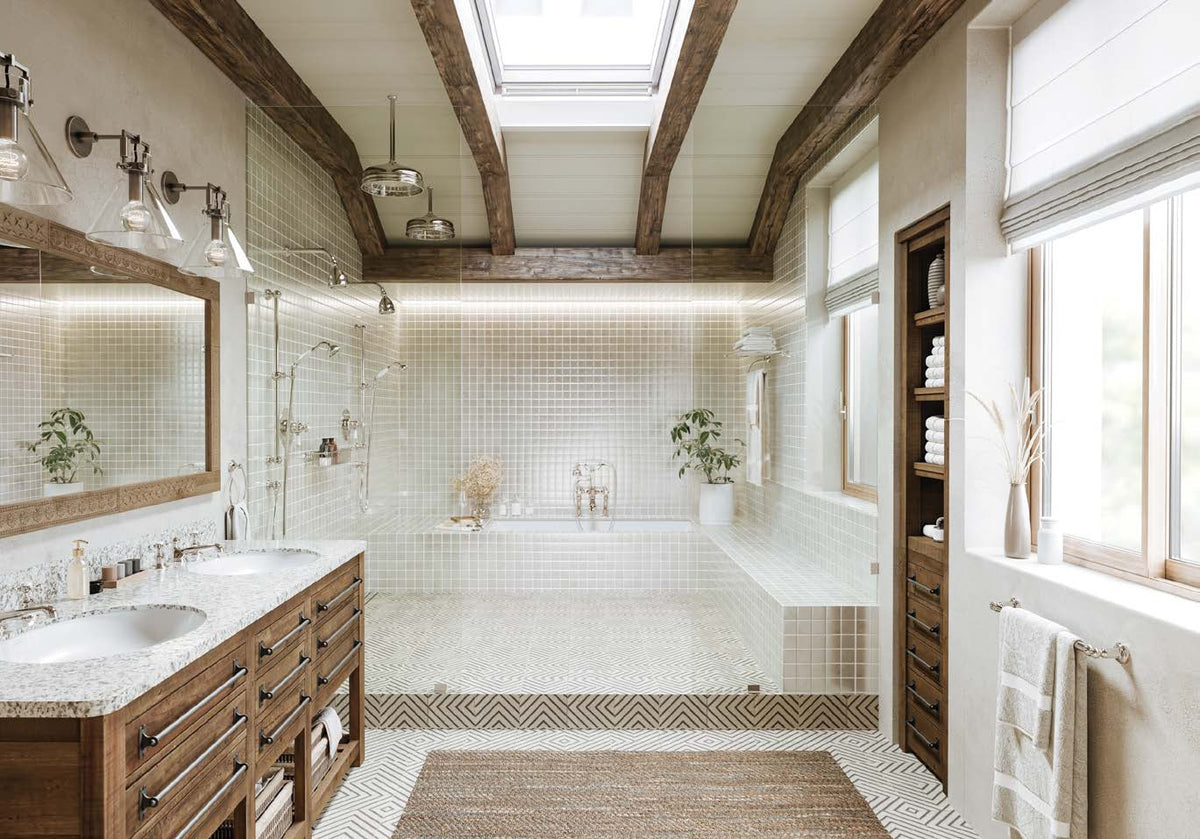 Perrin & Rowe Edwardian lavatory faucet, freestanding tub filler and towel rings in a silver-toned bathroom interior