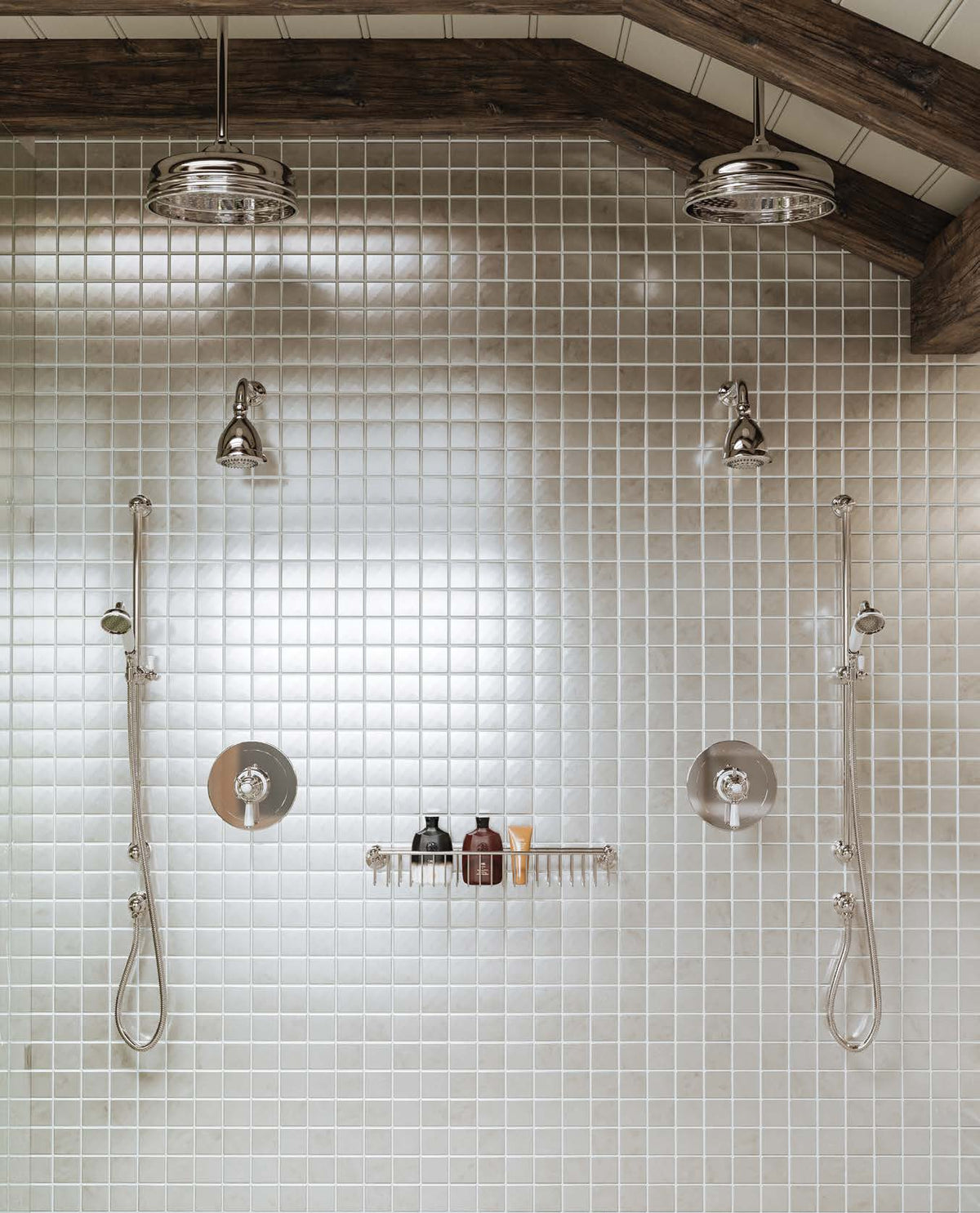 Perrin & Rowe Edwardian shower fixtures and metal-handle handshower in a silver-toned shower setting