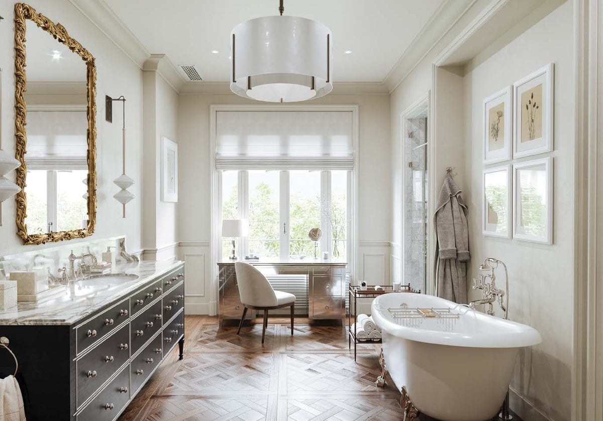 Perrin & Rowe Georgian Era column-spout lavatory faucet and traditional tub filler in a silver-toned bathroom interior