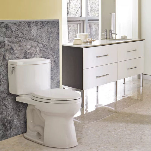 Toto DrakeÂ® II Two-Piece Toilet 1.28 GPF - Elongated front bowl - Golzar Home