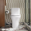 Spacity™ One-piece compact elongated toilet with skirted trapway, 1.28 gpf