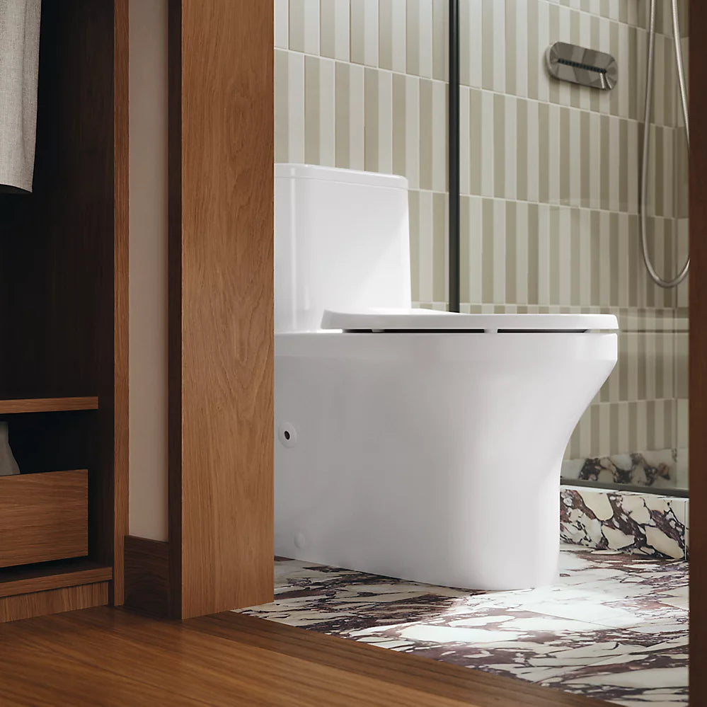 Spacity™ One-piece compact elongated toilet with skirted trapway, 1.28 gpf