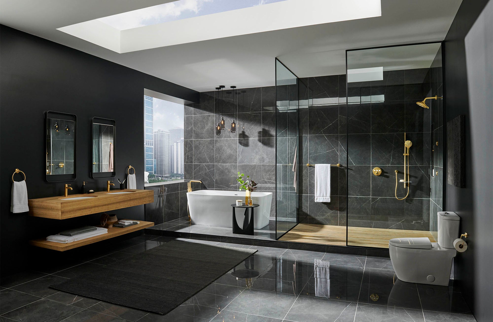 A contemporary bathroom with GROHE Essence fixtures and warm metallic finishes