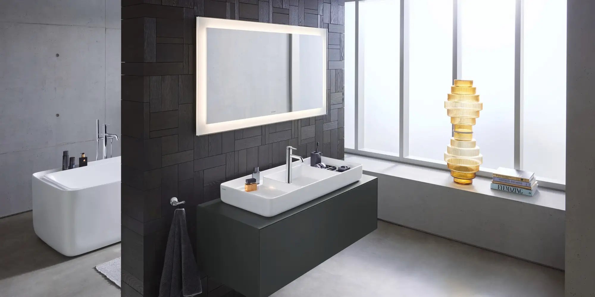 Duravit Bento Starck Box bathroom with a sculptural washbasin, floating vanity and freestanding bathtub